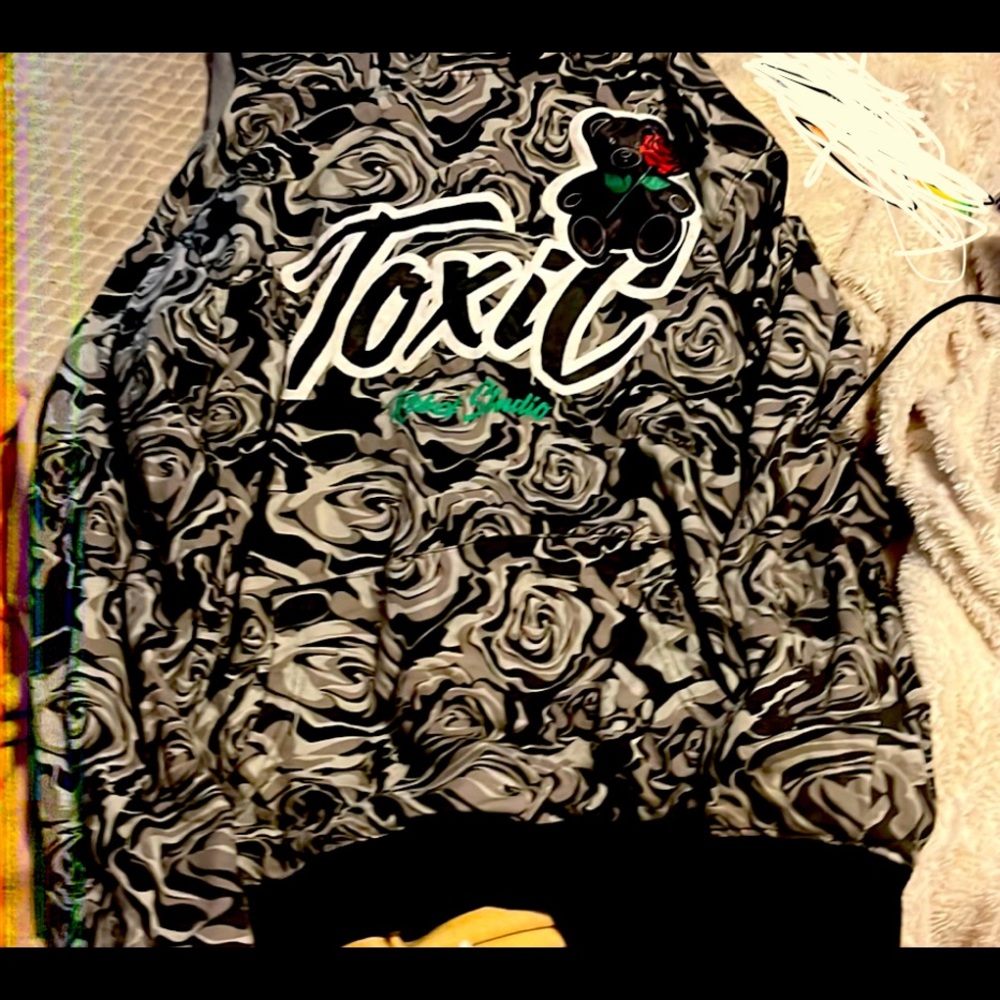 grey and back toxic hoodie with little black bear and roses.